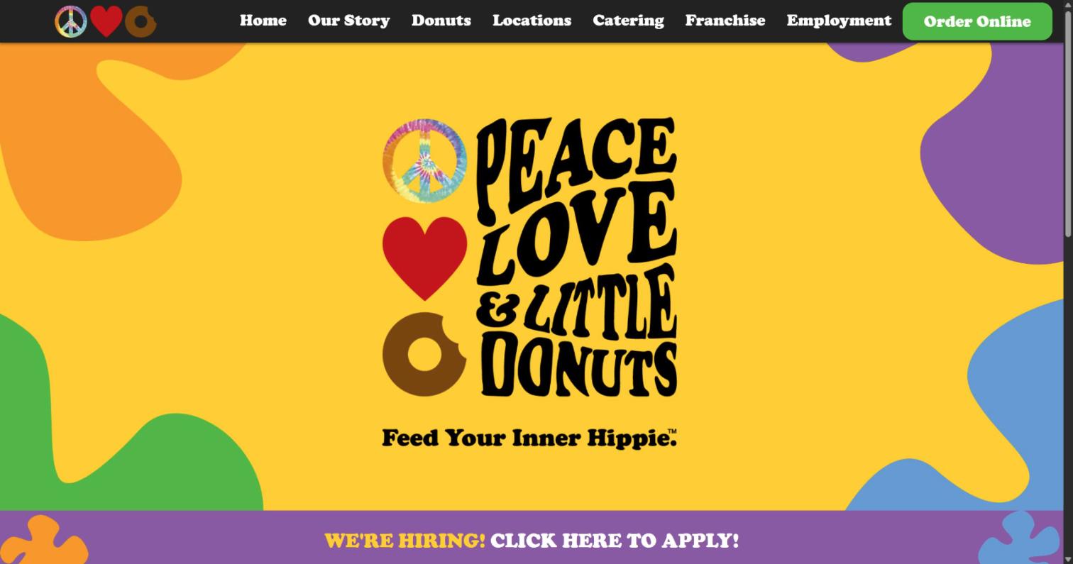 Homepage of peaceloveandlittledonuts.com with the tie-dye peace, love and donut logo on a yellow background